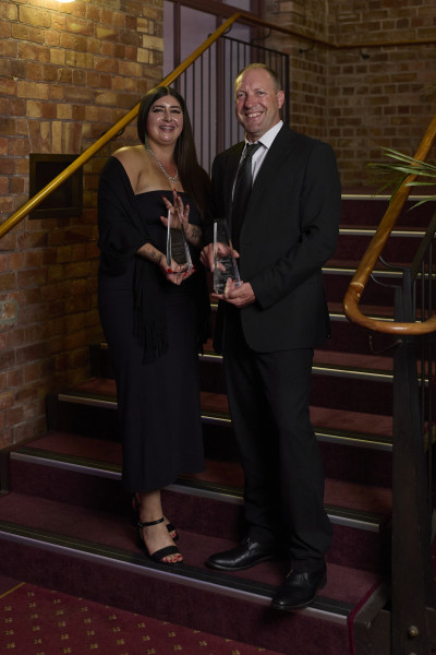 Image of Ruby holding her award. 