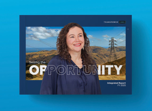 Image of the cover of Transpower's Integrated Report featuring a woman with dark curly hair wearing a blue shirt. The cover of the document is on a blue background.