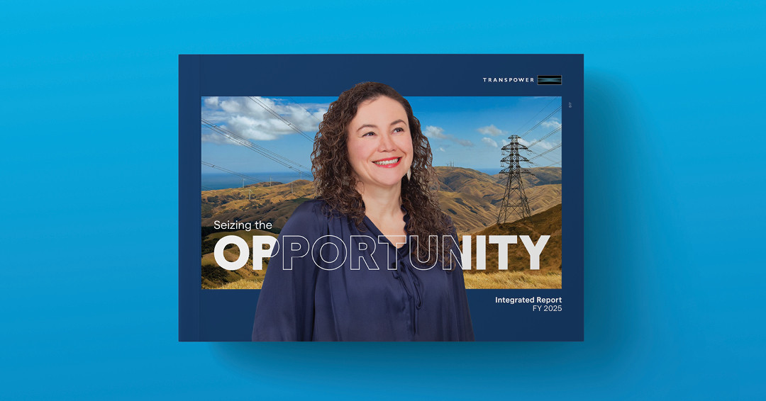 Image of the cover of Transpower's Integrated Report featuring a woman with dark curly hair wearing a blue shirt. The cover of the document is on a blue background.